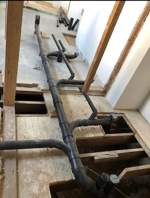 Commercial plumbing under floor